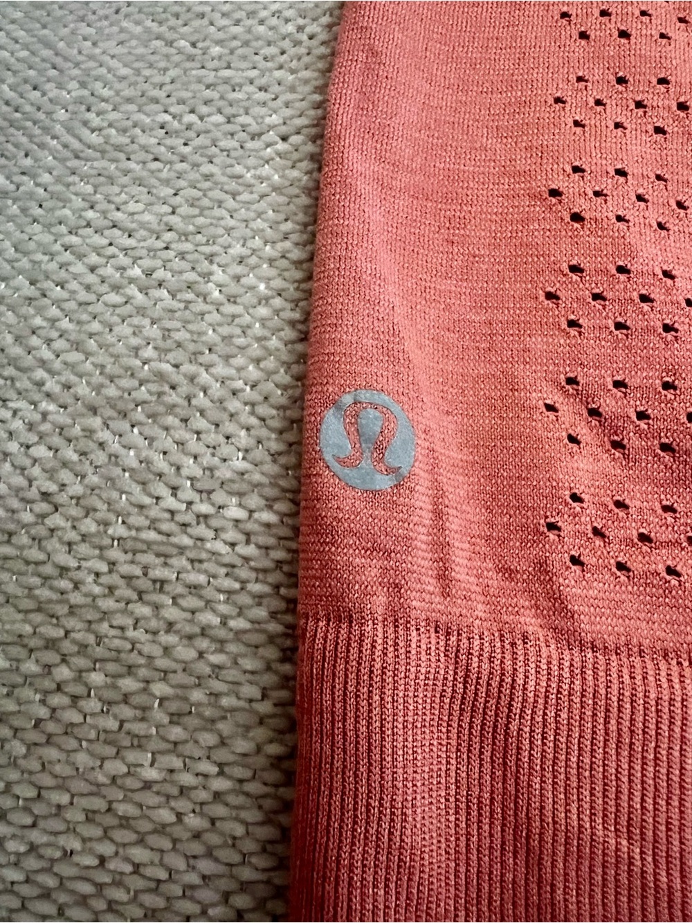 Lululemon Perforated Sleeveless Tank in the Coral/ Terracotta